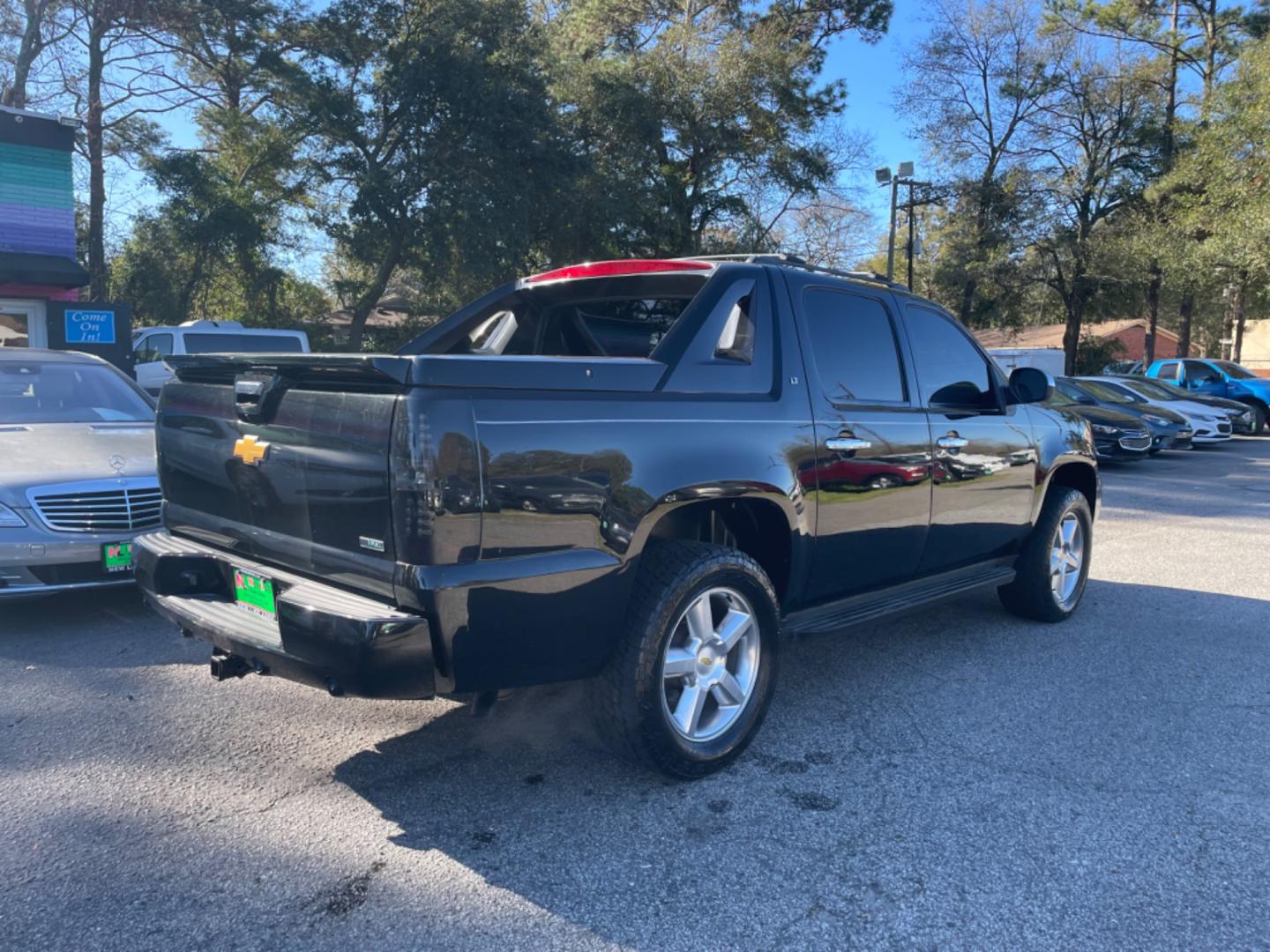 2011 BLACK CHEVROLET AVALANCHE LT (3GNMCFE09BG) with an 5.3L engine, Automatic transmission, located at 5103 Dorchester Rd., Charleston, SC, 29418-5607, (843) 767-1122, 36.245171, -115.228050 - Leather, CD/AUX/Sat, backup Camera, Dual Climate Control, Power Everything (windows, locks, seats, mirrors), All-weather Mats, Keyless Entry, Running Boards, Tow Package, Alloy Wheels. 174k miles Located at New Life Auto Sales! 2023 WINNER for Post & Courier's Charleston's Choice Pre-owned Car Deale - Photo#6